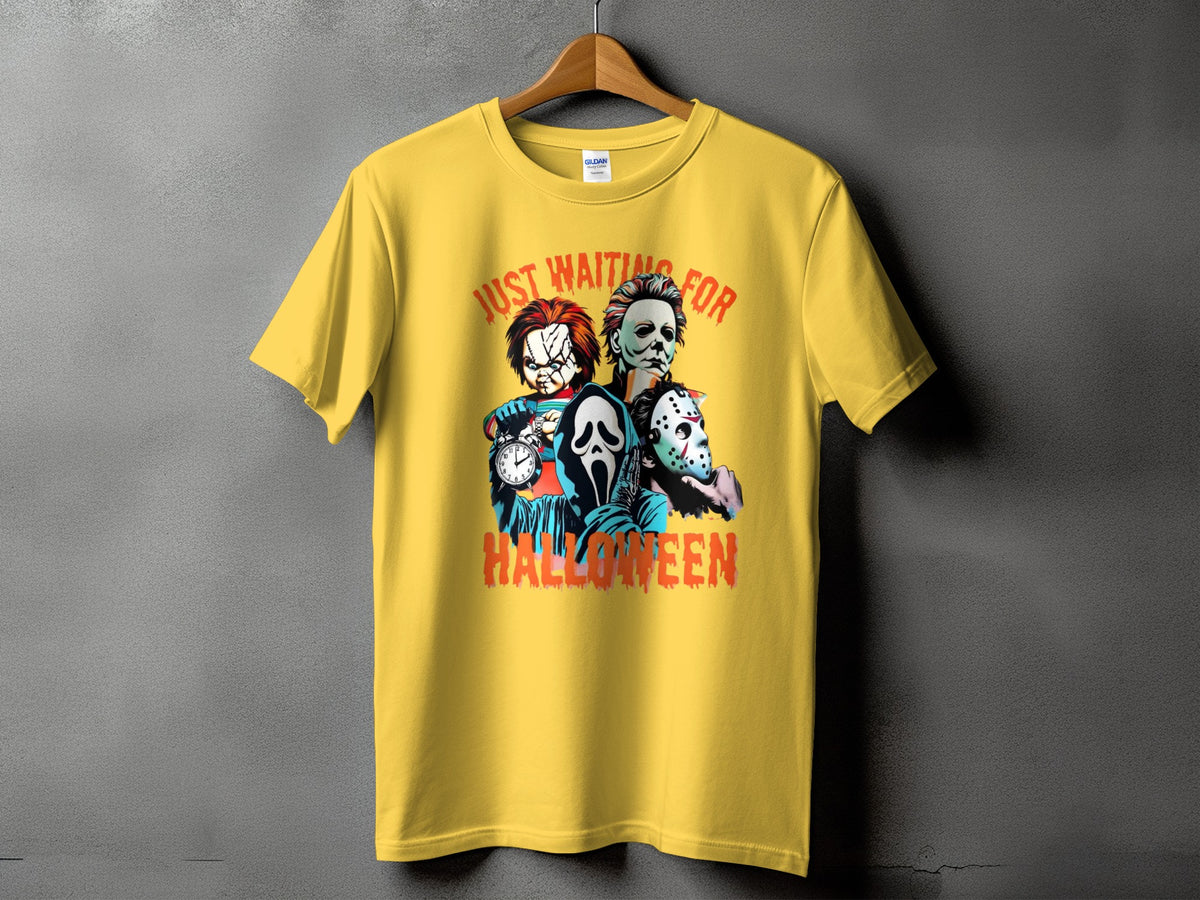 Yellow t-shirt with "Just Waiting For Halloween" and horror characters.