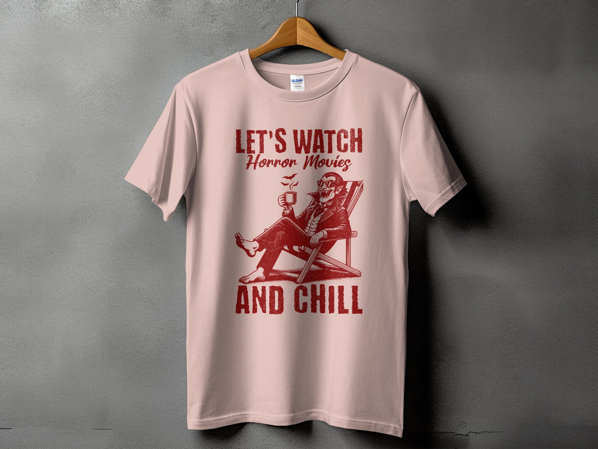 Pink t-shirt with "LET'S WATCH Horror Movies AND CHILL" text and vampire graphic.