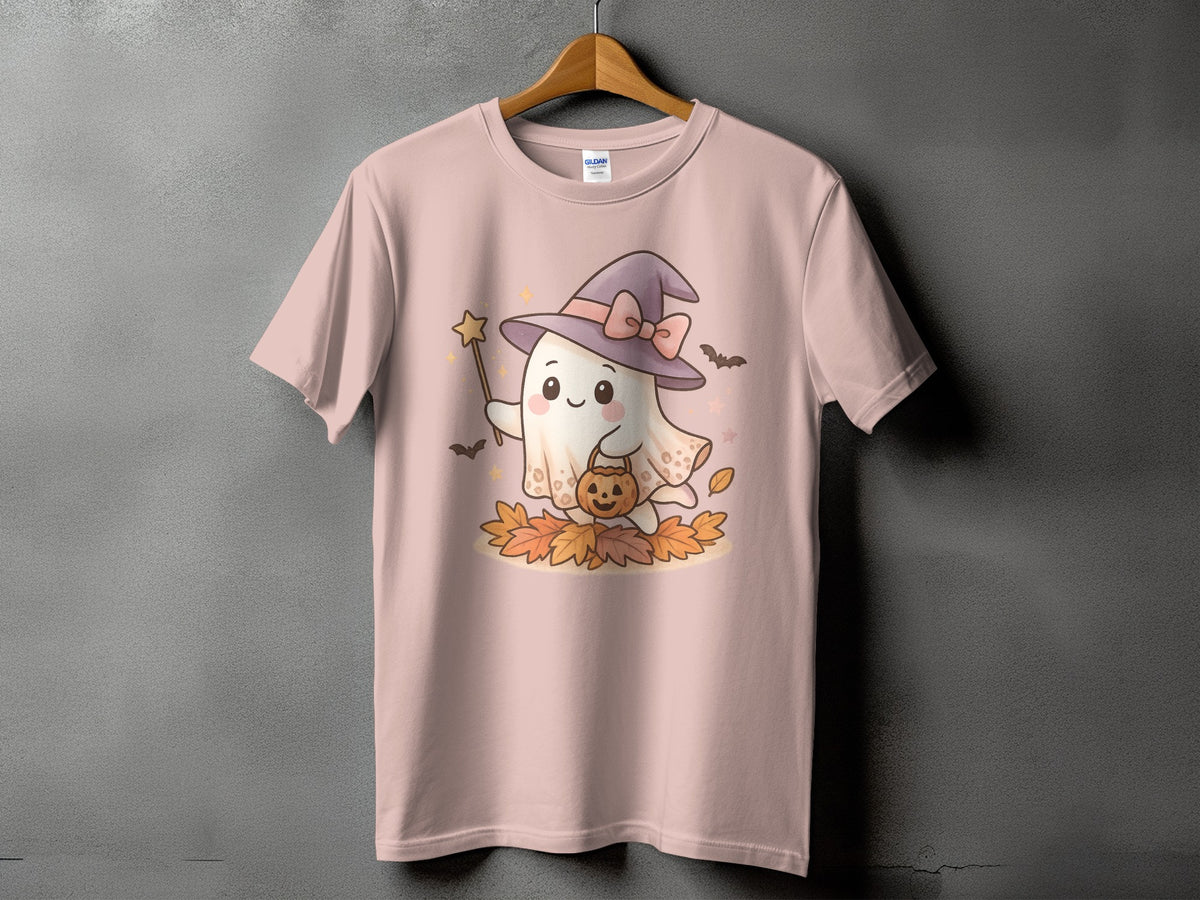 Pink t-shirt featuring a cute ghost wearing a witch hat holding a pumpkin and a wand.