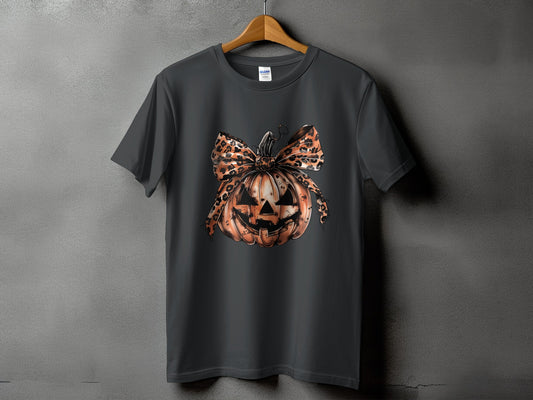 Dark gray t-shirt with a Halloween pumpkin graphic and leopard print bow.