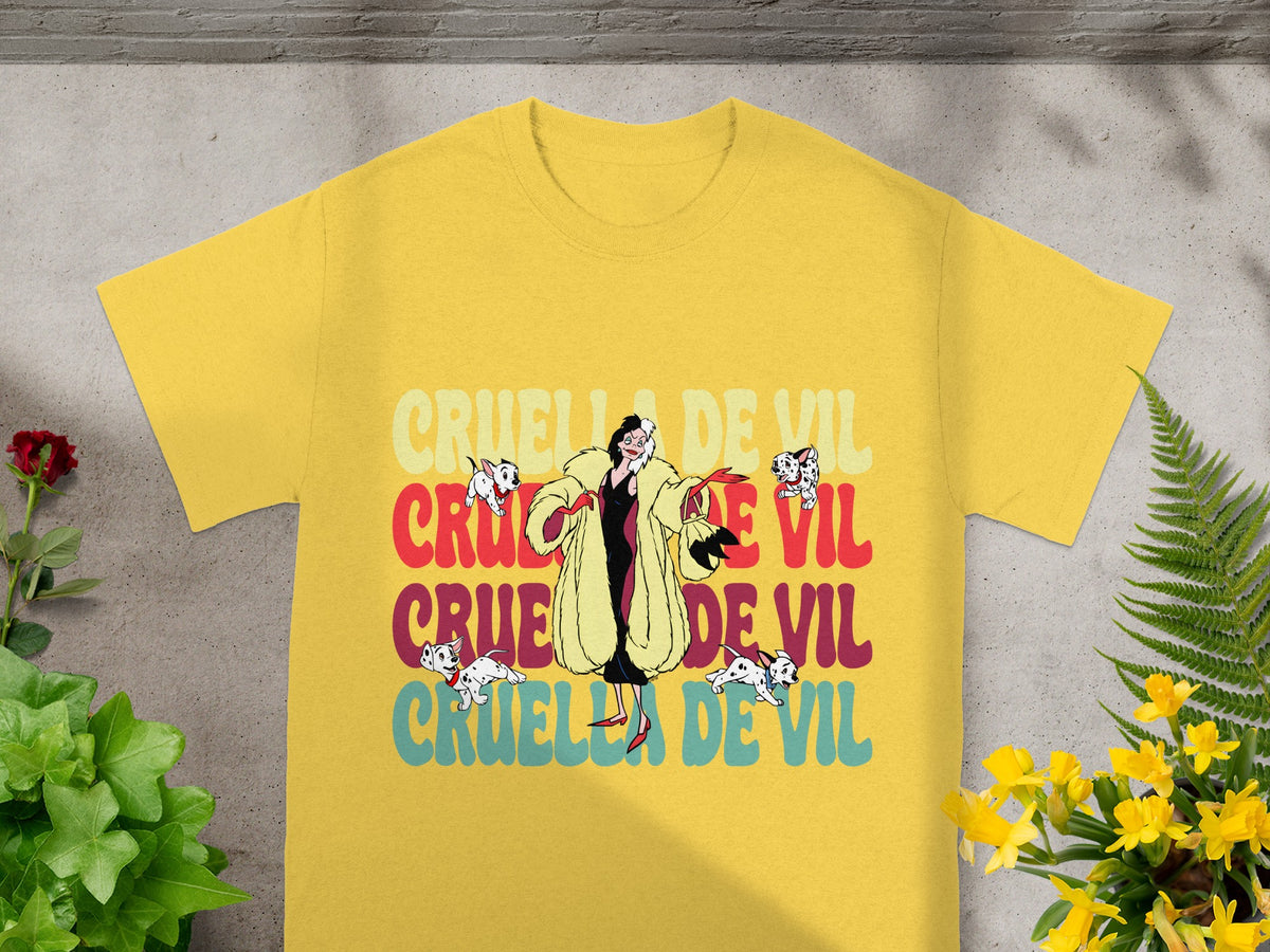 Yellow t-shirt with "Cruella De Vil" text and cartoon dogs.