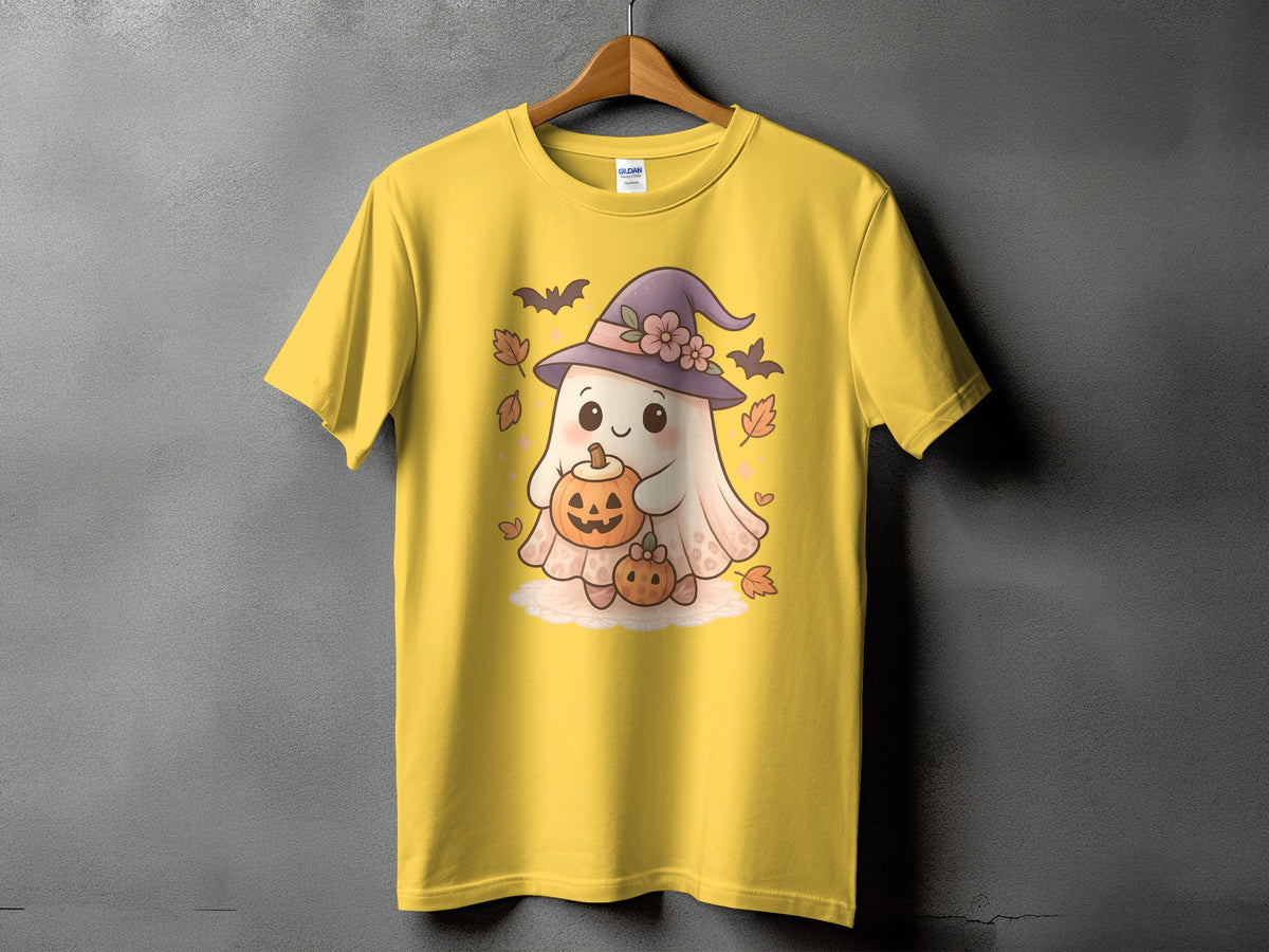 Yellow t-shirt with a cartoon ghost wearing a witch hat and holding pumpkins.