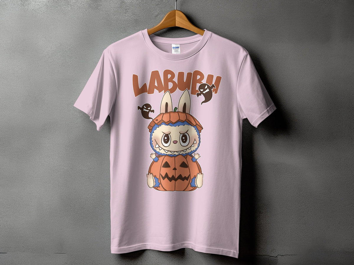 Pink t-shirt with "LABURU" text and a cute monster in a pumpkin costume.