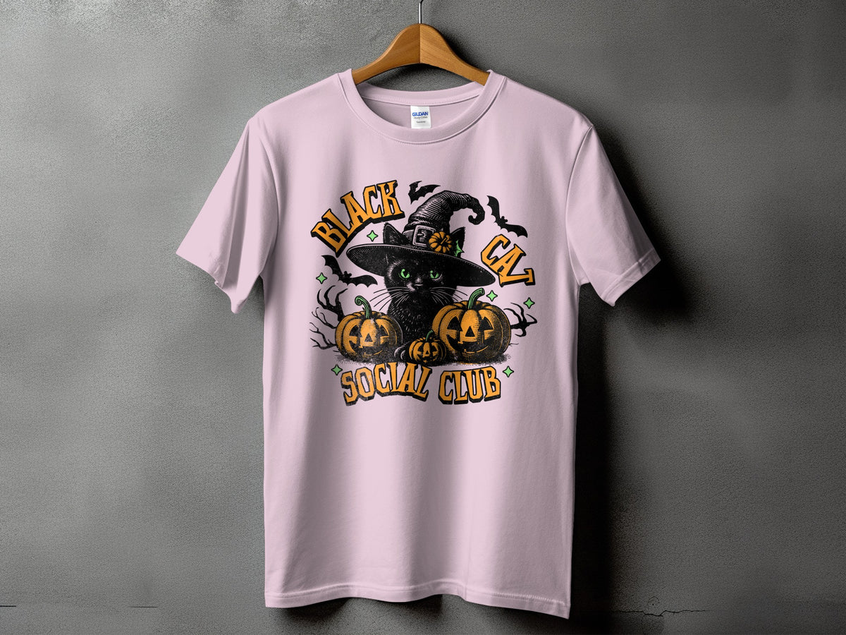 Pink t-shirt with a black cat, pumpkins, bats, and "Black Cat Social Club" text.