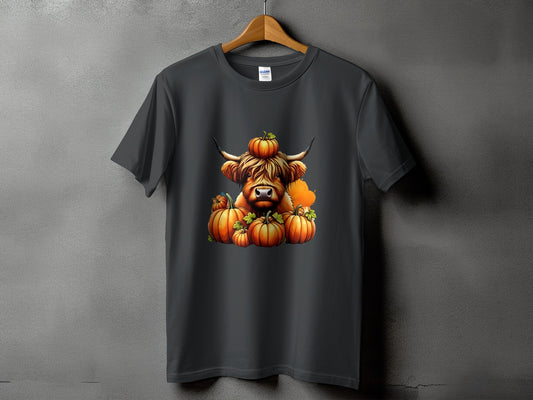 Dark gray t-shirt with Highland cow and pumpkins graphic.