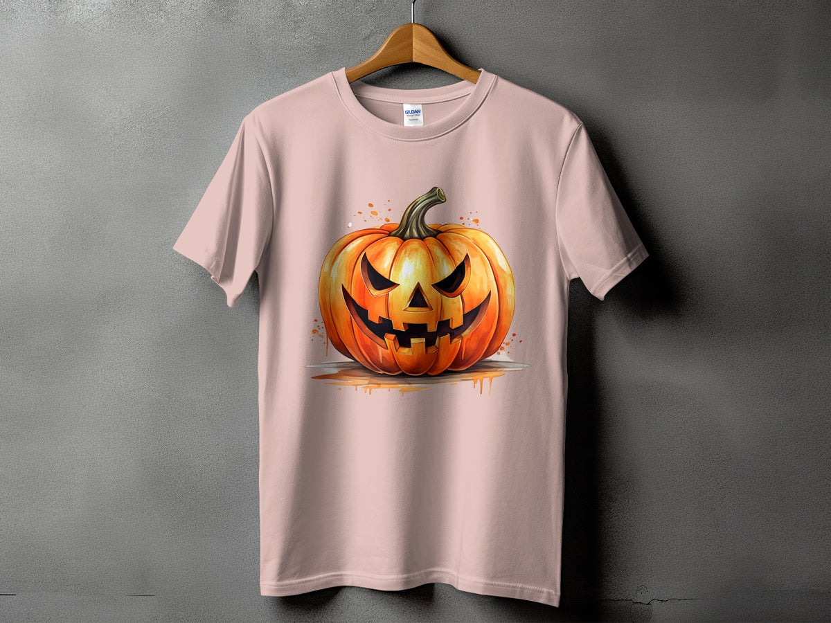 Pink t-shirt with a watercolor illustration of a spooky jack-o'-lantern.