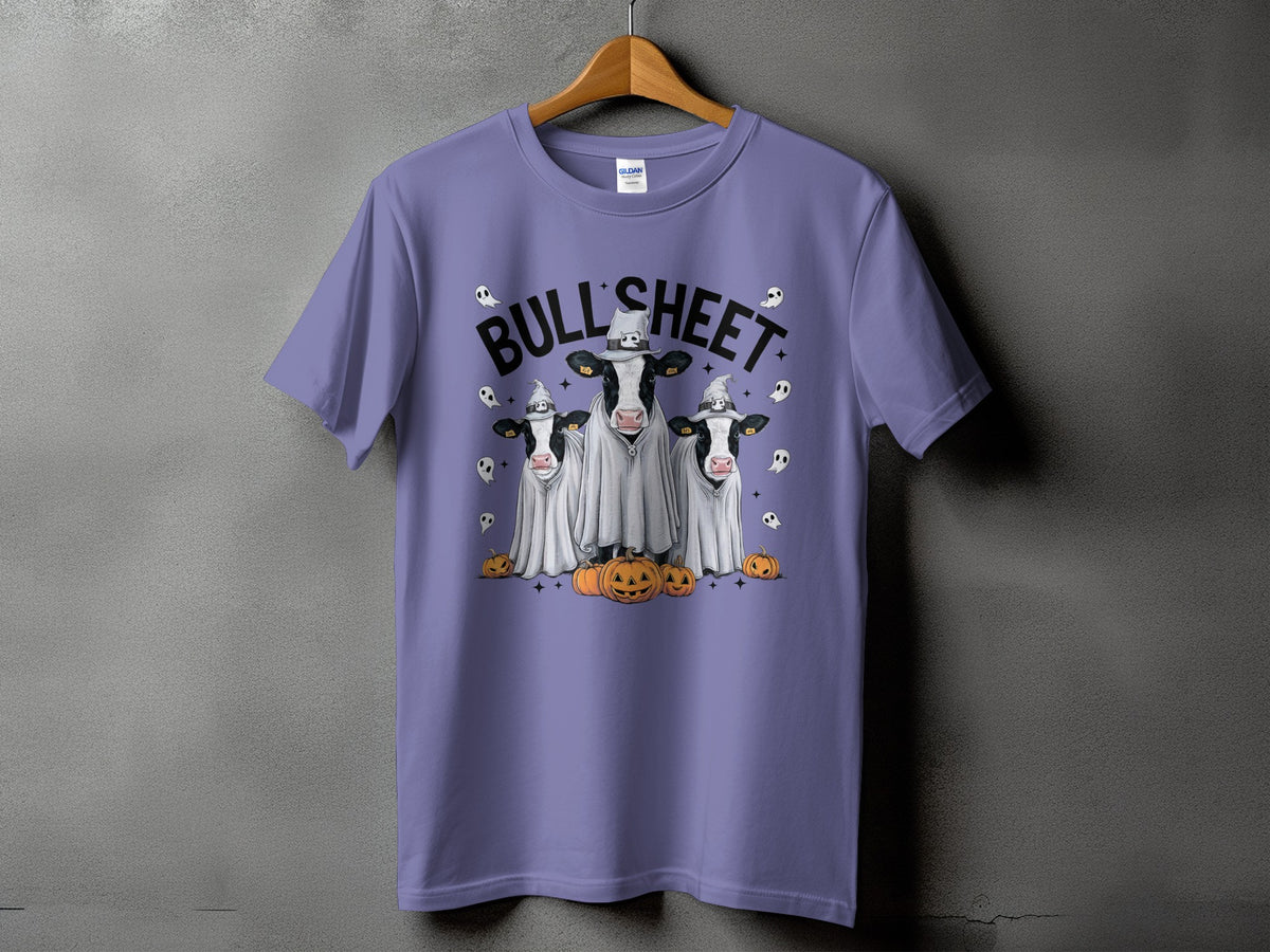Three cows dressed as ghosts with pumpkins and "BULL SHEET" text.