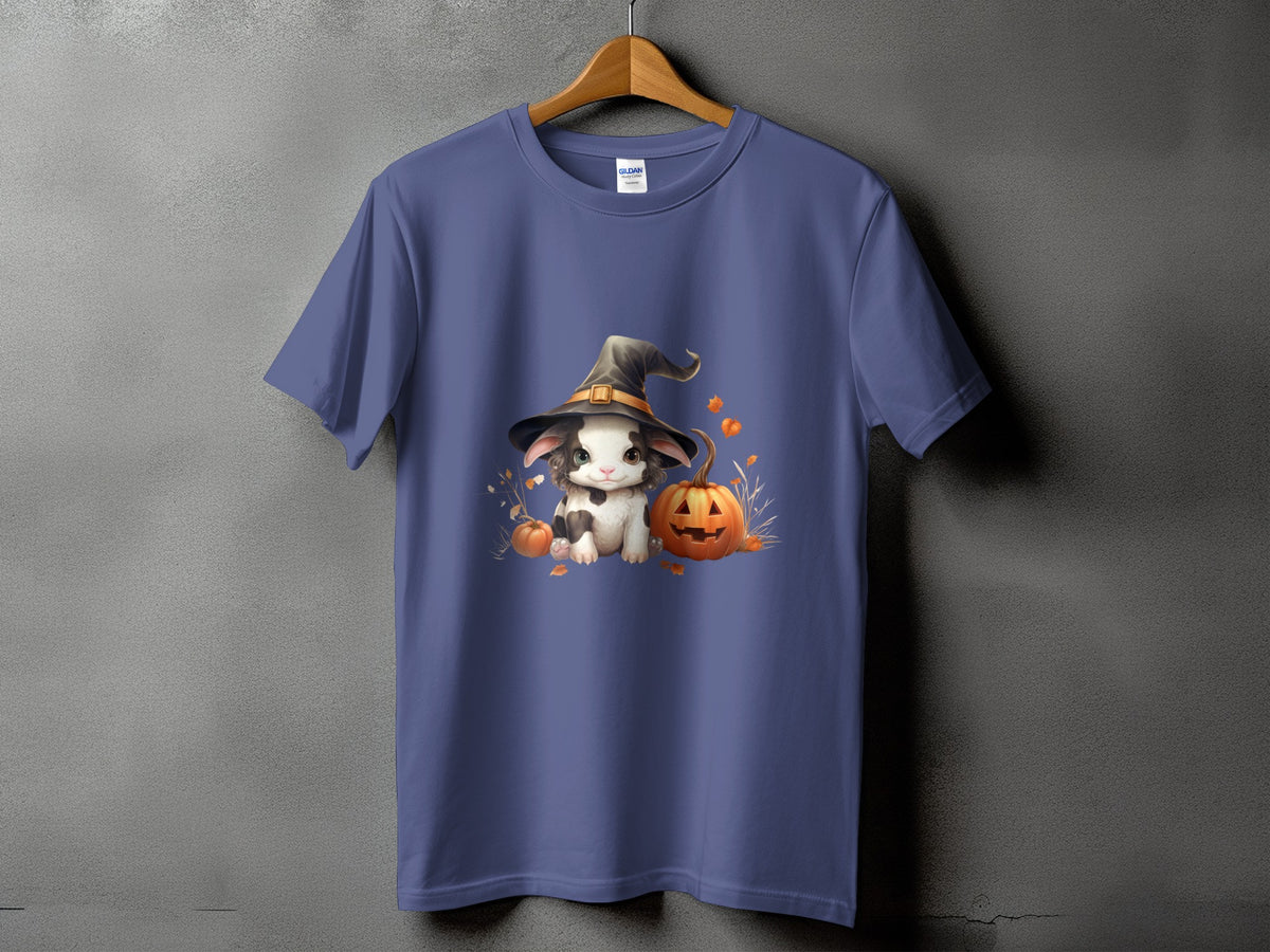 Cute bunny in witch hat with pumpkins and autumn leaves graphic on a purple t-shirt.