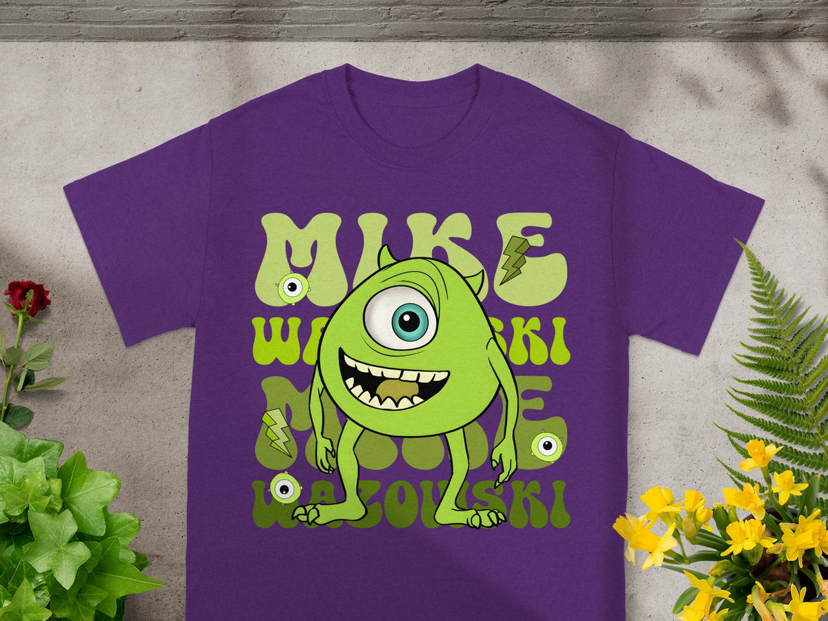 Purple t-shirt with cartoon green monster "Mike Wazowski" graphic.