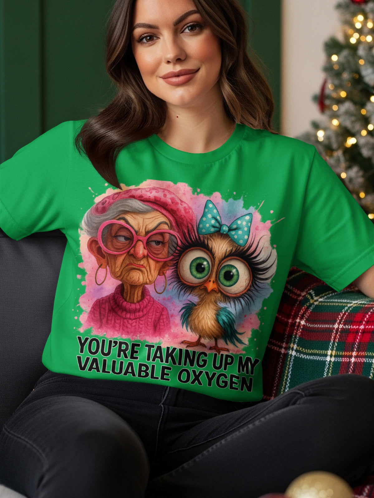 Green t-shirt with an owl and elderly woman graphic and text.