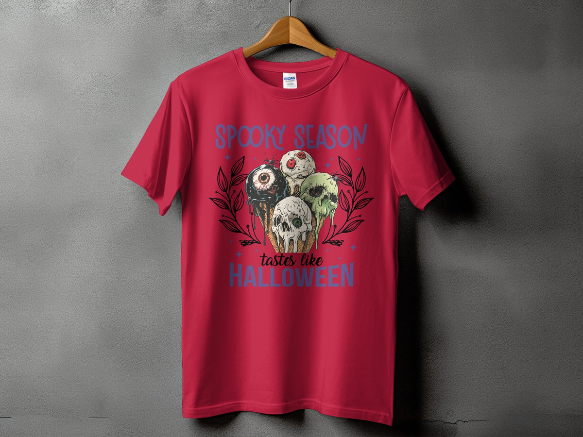 Red t-shirt with "Spooky Season tastes like Halloween" and dripping ice cream cone design.