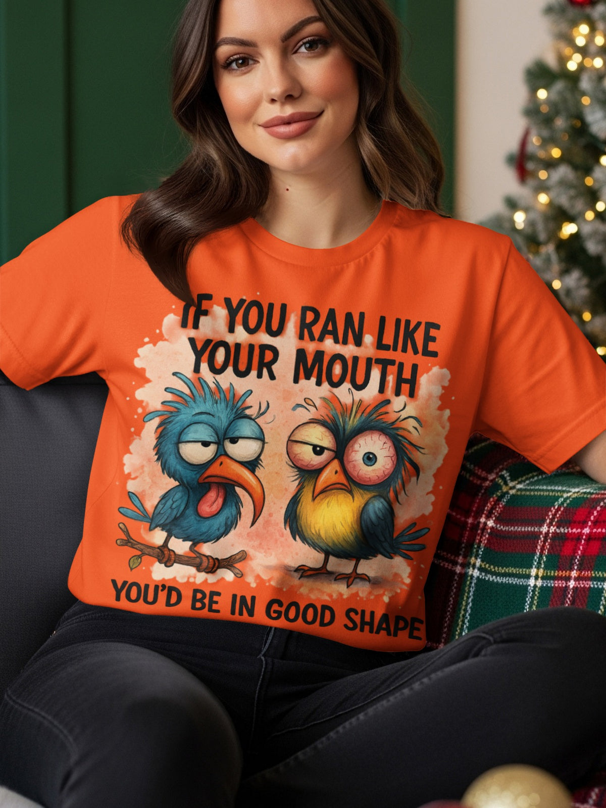 Orange t-shirt with cartoon birds and text "IF YOU RAN LIKE YOUR MOUTH YOU'D BE IN GOOD SHAPE".