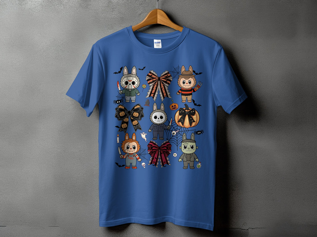 Blue t-shirt with Halloween character graphic featuring bunnies and monsters.