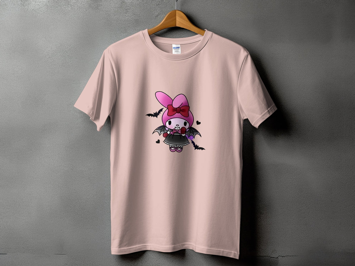 Pink t-shirt with a cartoon bunny character dressed as a vampire.