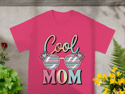 Pink t-shirt with "Cool MOM" text and sunglasses graphic.