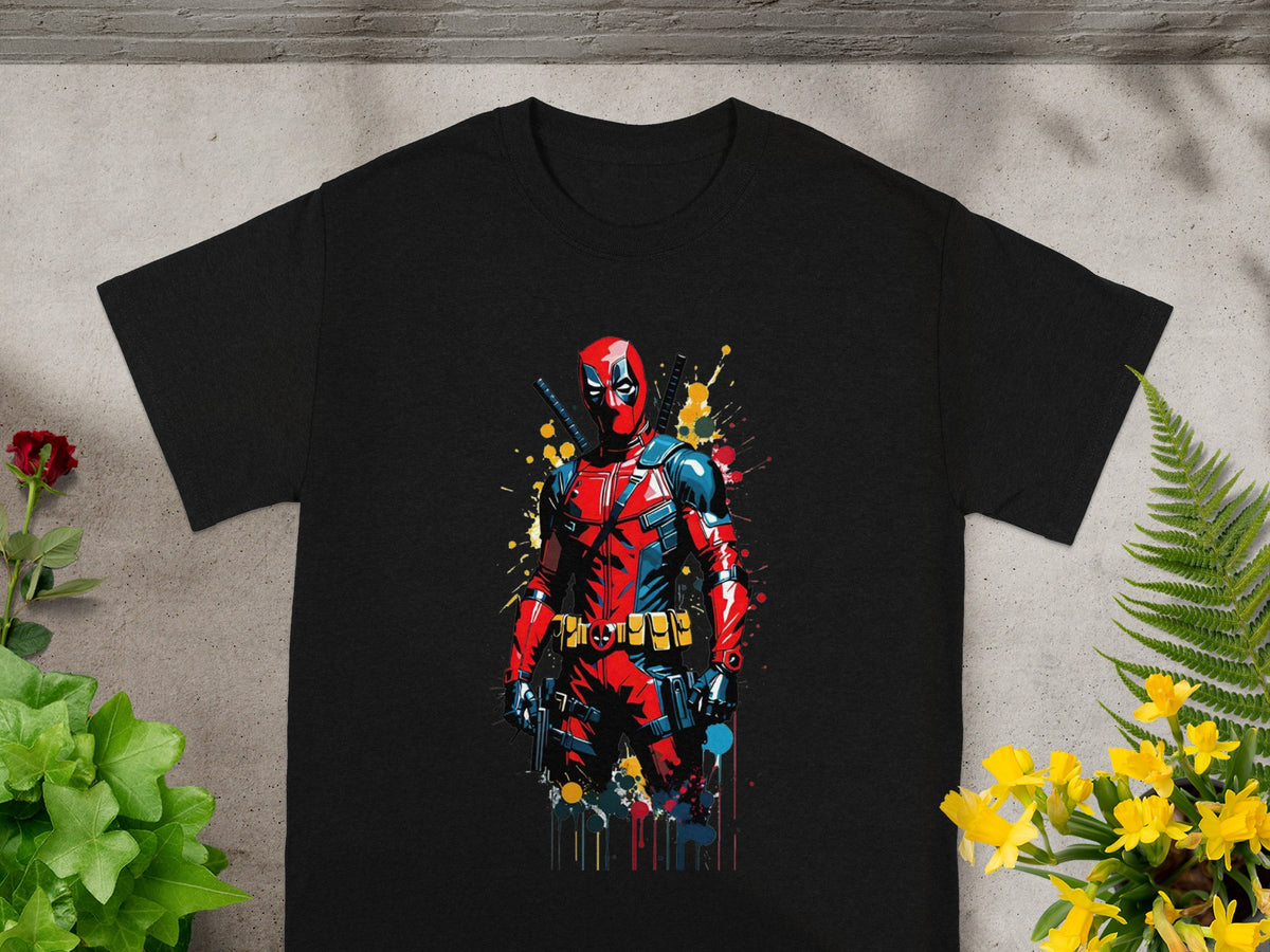 Black t-shirt featuring a colorful, action-ready Deadpool character illustration.