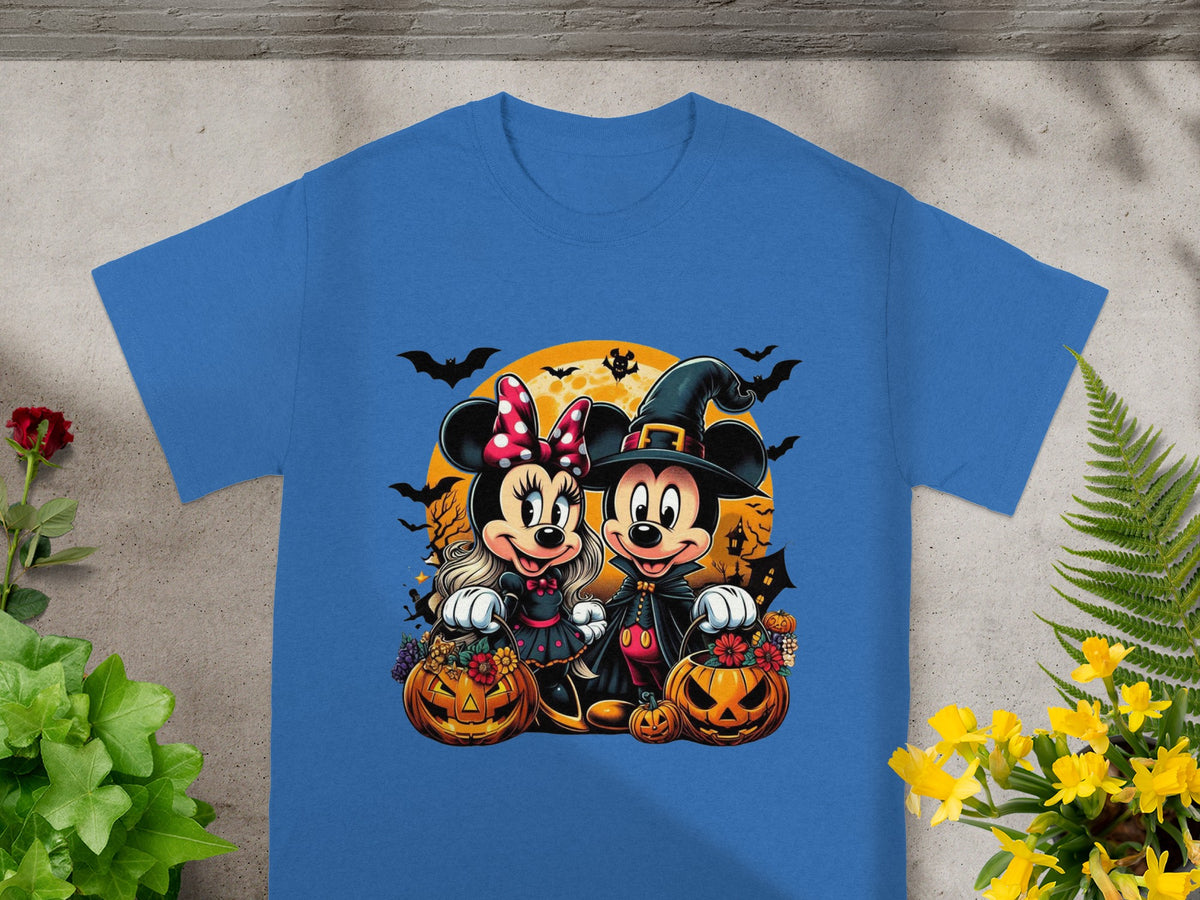 Mickey and Minnie Mouse in Halloween costumes with pumpkins and bats.