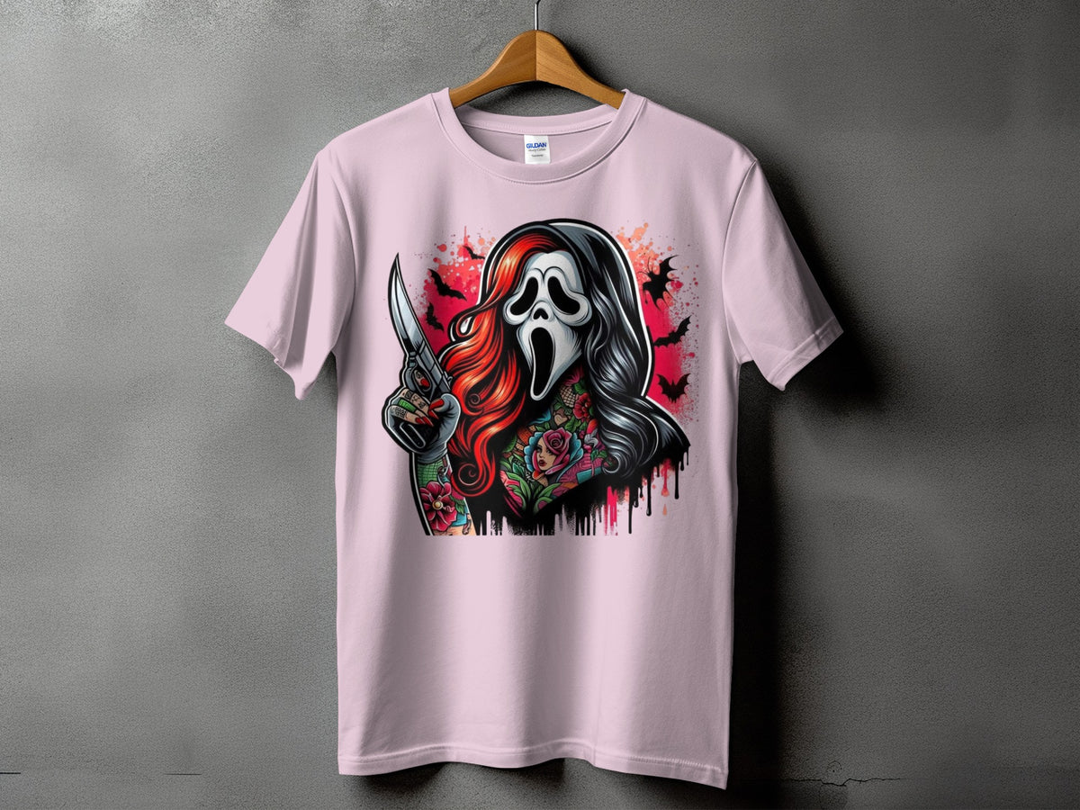 Pink t-shirt with graphic of Ghostface mask, knife, tattoos, and bats.
