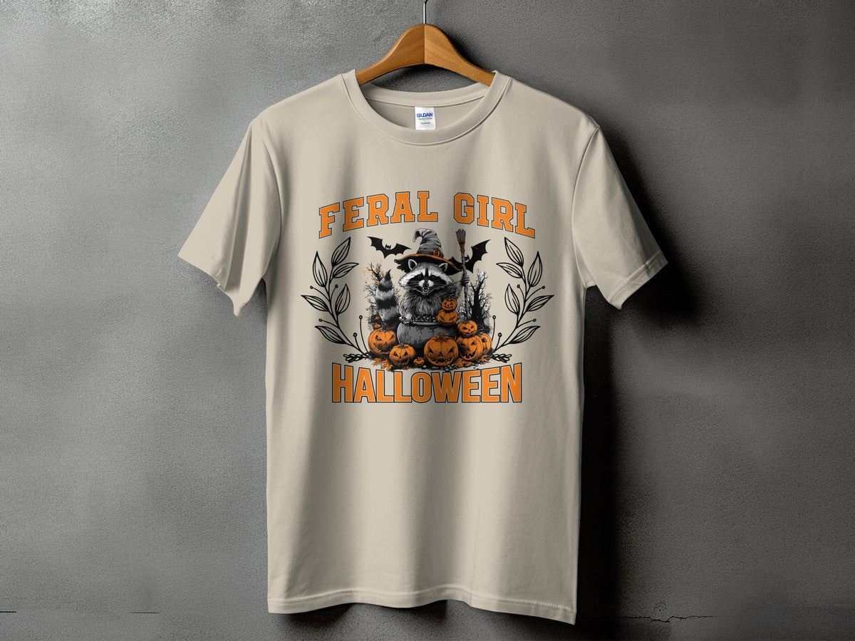 T-shirt with raccoon, pumpkins, bats, and text "FERAL GIRL HALLOWEEN."