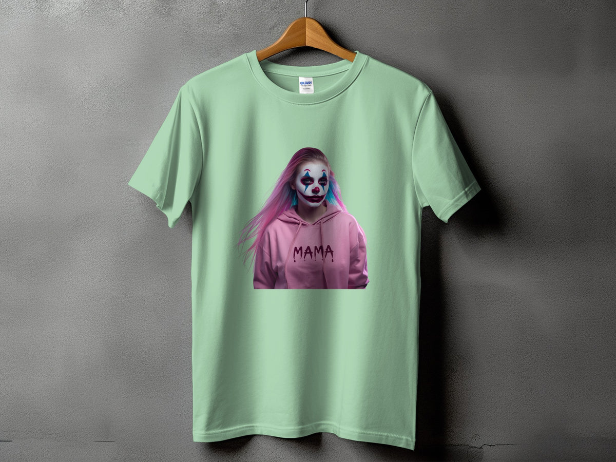 Light green t-shirt with a graphic of a person in clown makeup and a pink hoodie reading "MAMA".