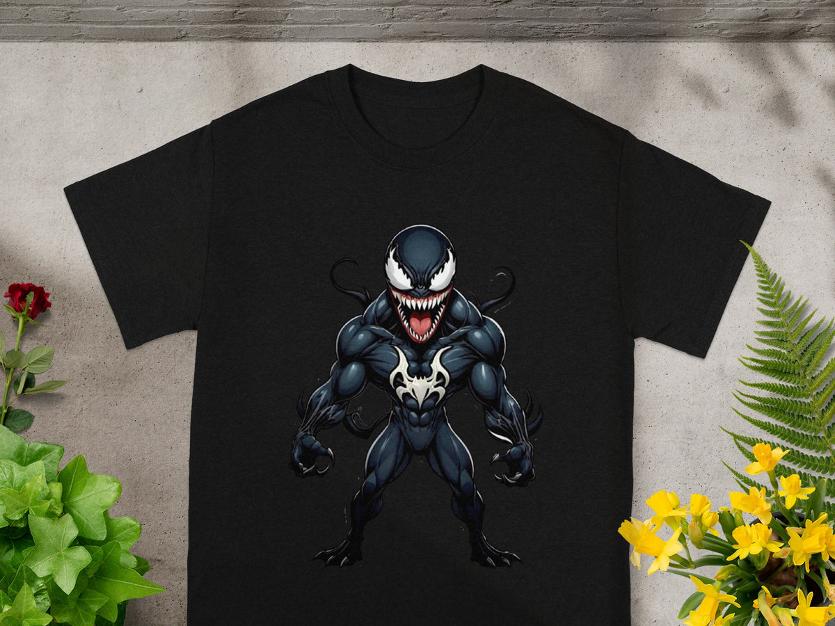 Black t-shirt featuring Venom character with sharp teeth and white eyes.