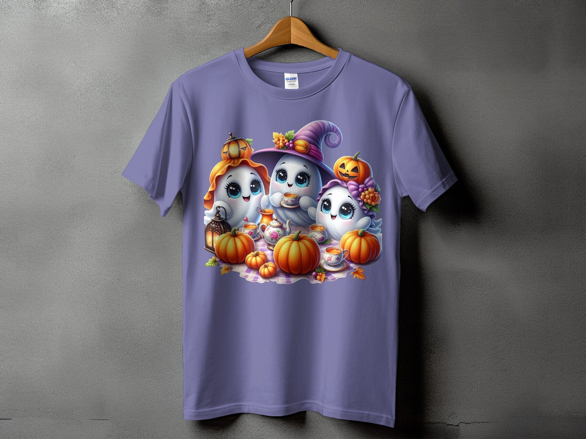 Three cute ghosts enjoy tea with pumpkins and a lantern on a purple t-shirt.