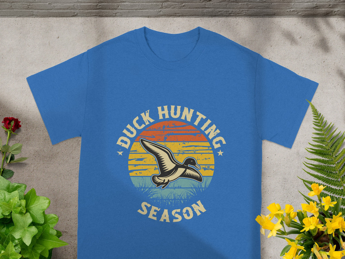 Blue t-shirt with "Duck Hunting Season" graphic and a flying duck.