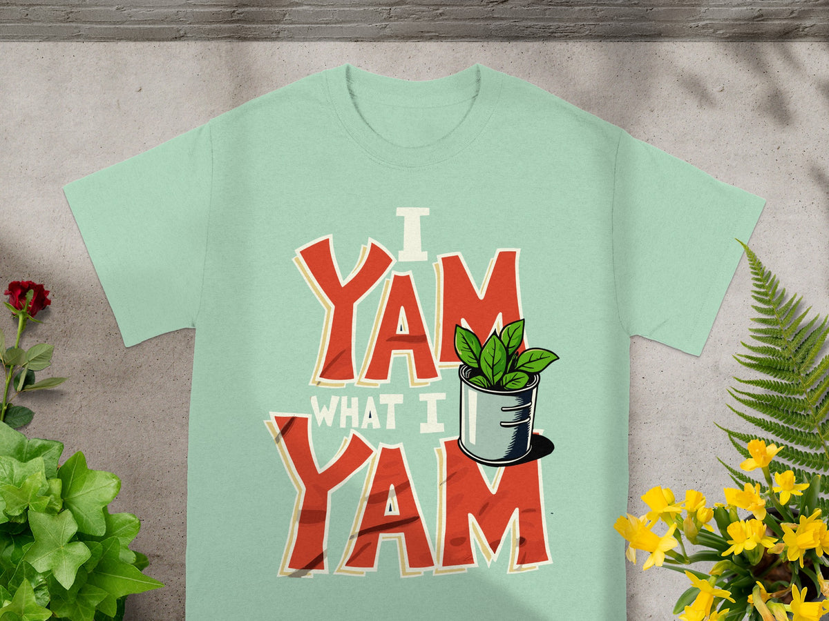Mint t-shirt with red "I Yam What I Yam" text and green potted plant.
