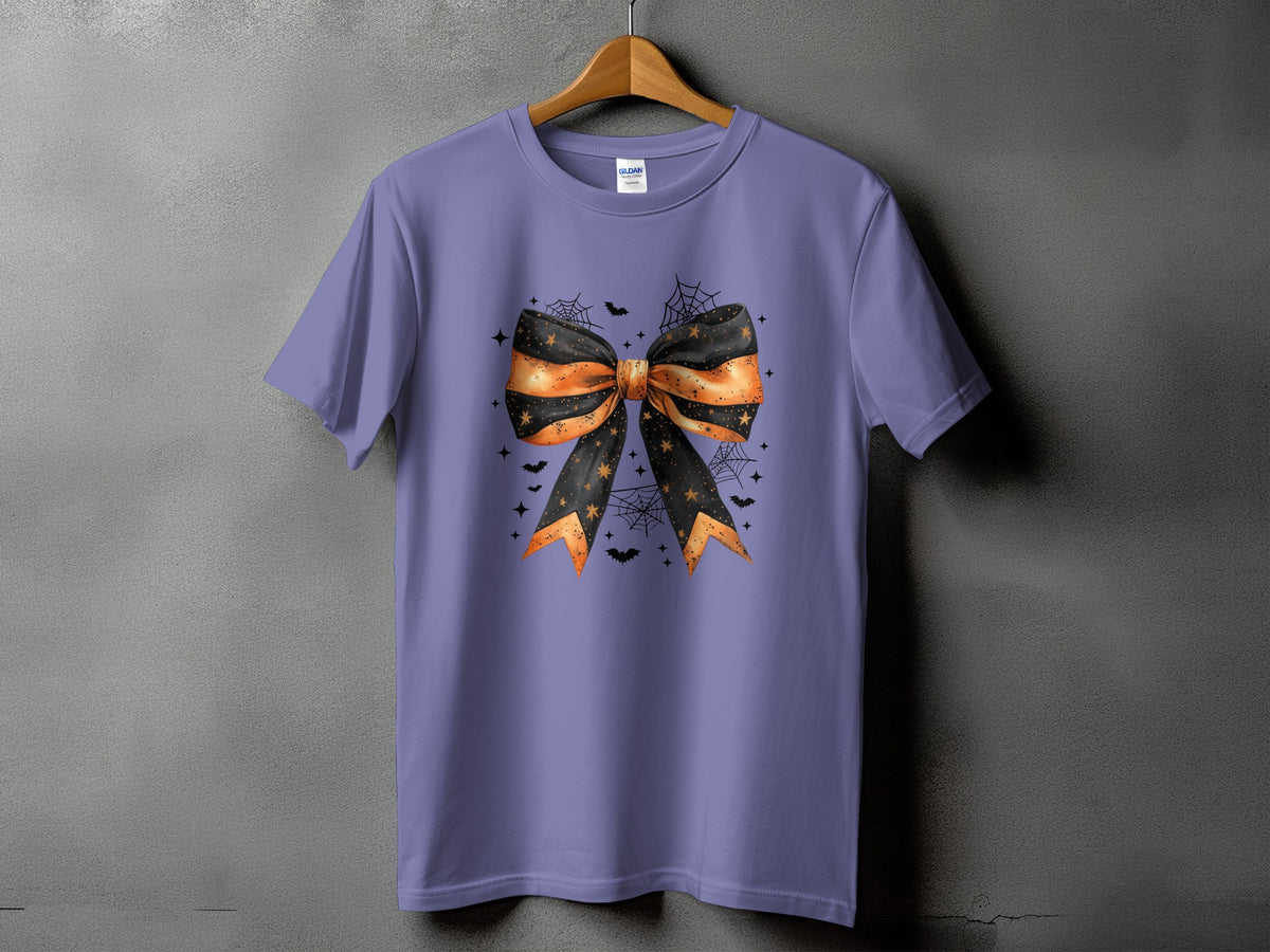 Purple t-shirt with Halloween bow, bats, cobwebs, and stars graphic.