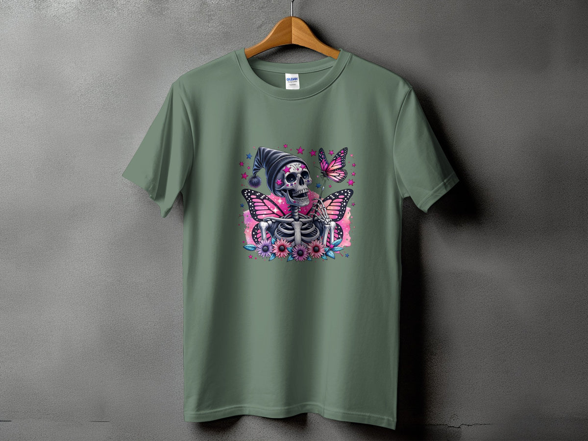 Green t-shirt with skeleton, pink butterflies, and flowers graphic.