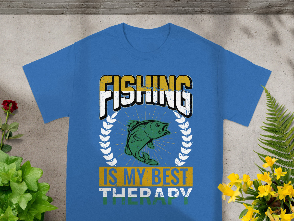 Blue t-shirt with text "FISHING IS MY BEST THERAPY" and a fish graphic.