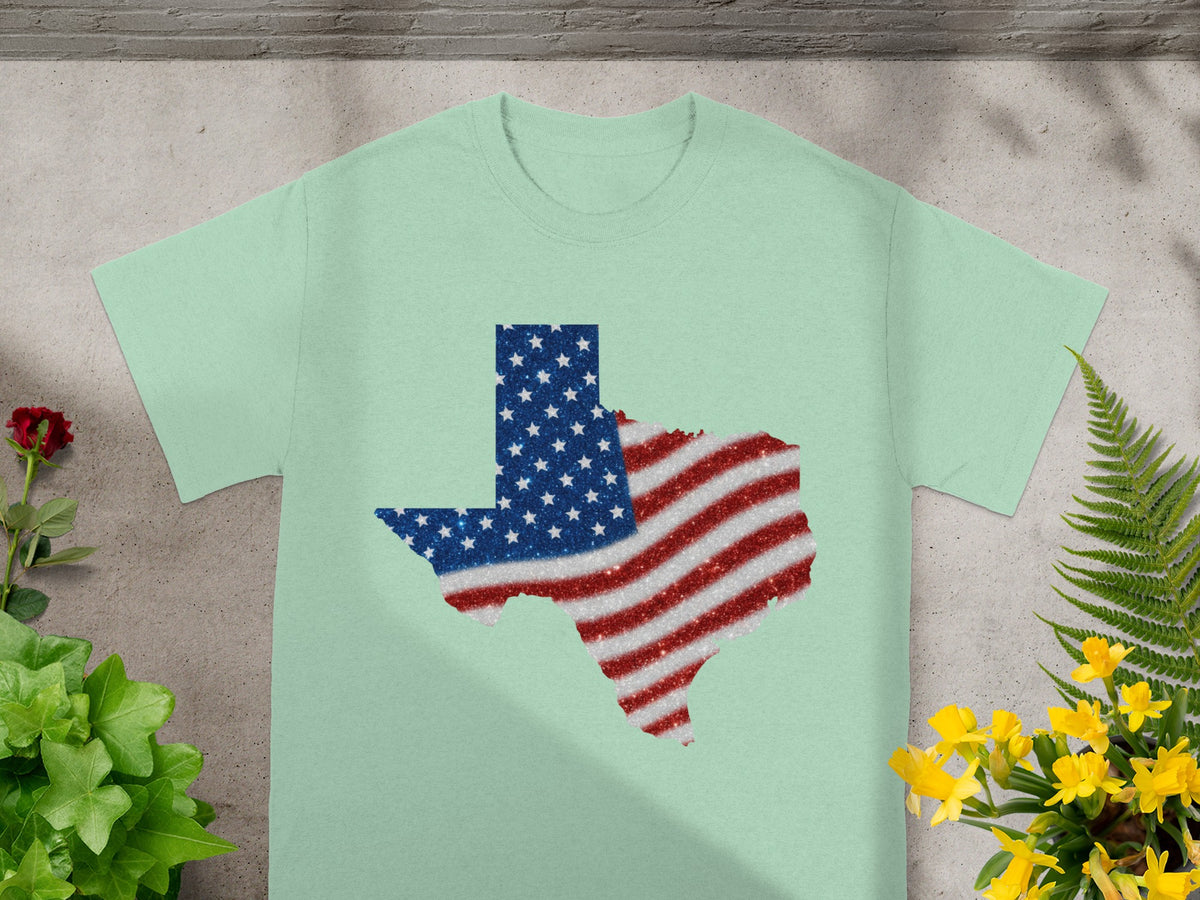 Light green t-shirt with Texas outline filled with American flag glitter design.