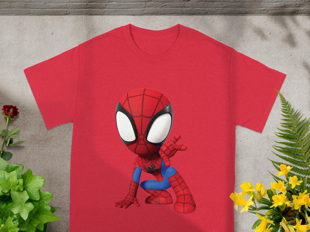 Red t-shirt with a cartoon Spiderman graphic, featuring greenery and yellow flowers.