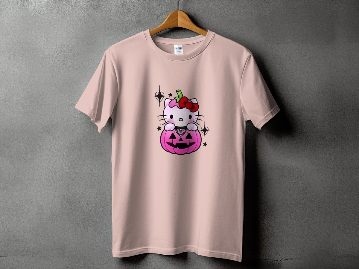 Pink t-shirt with Hello Kitty sitting inside a carved pumpkin with stars.