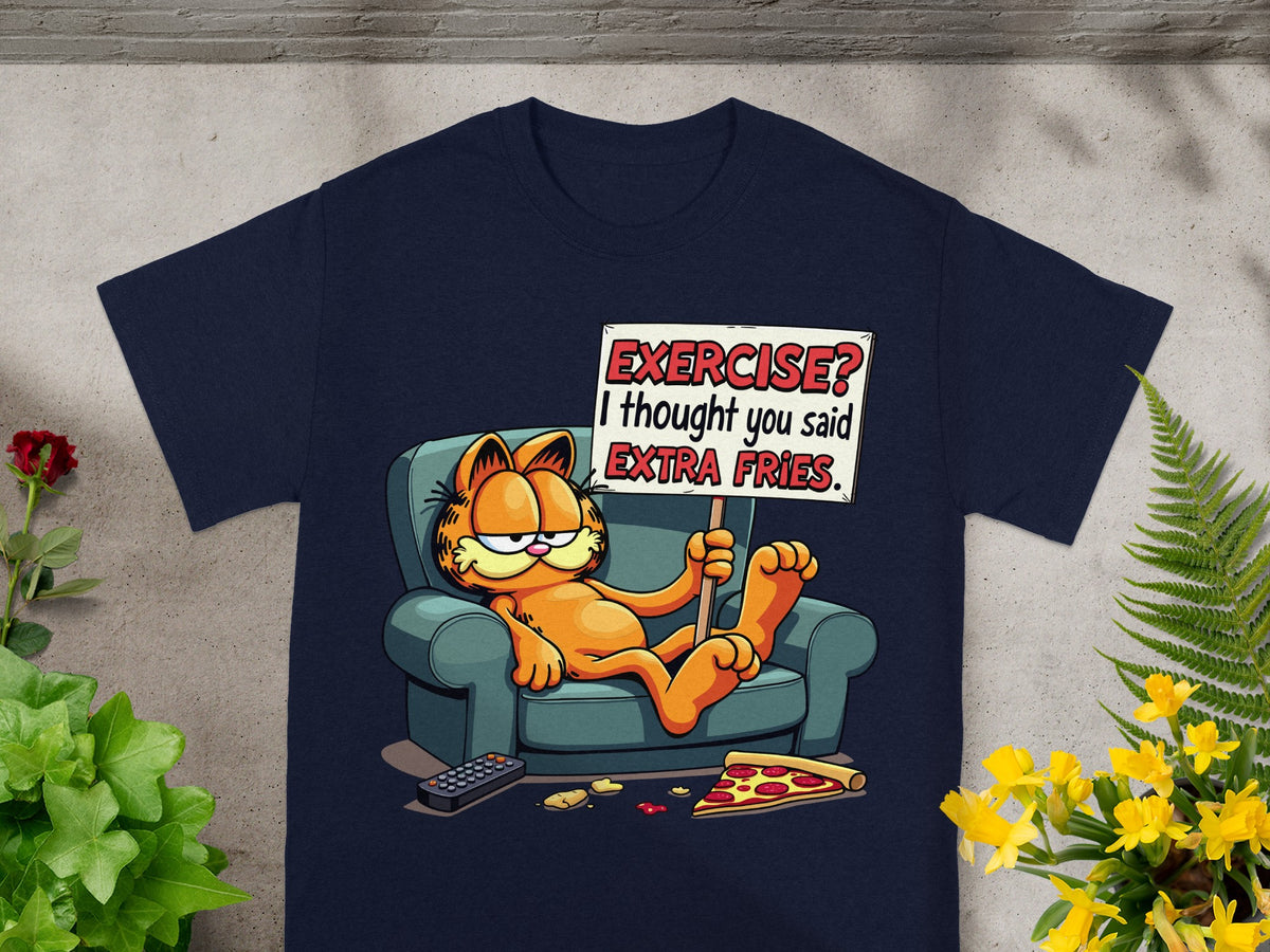 Garfield lounging on a couch holding a sign that says "Exercise? I thought you said extra fries."
