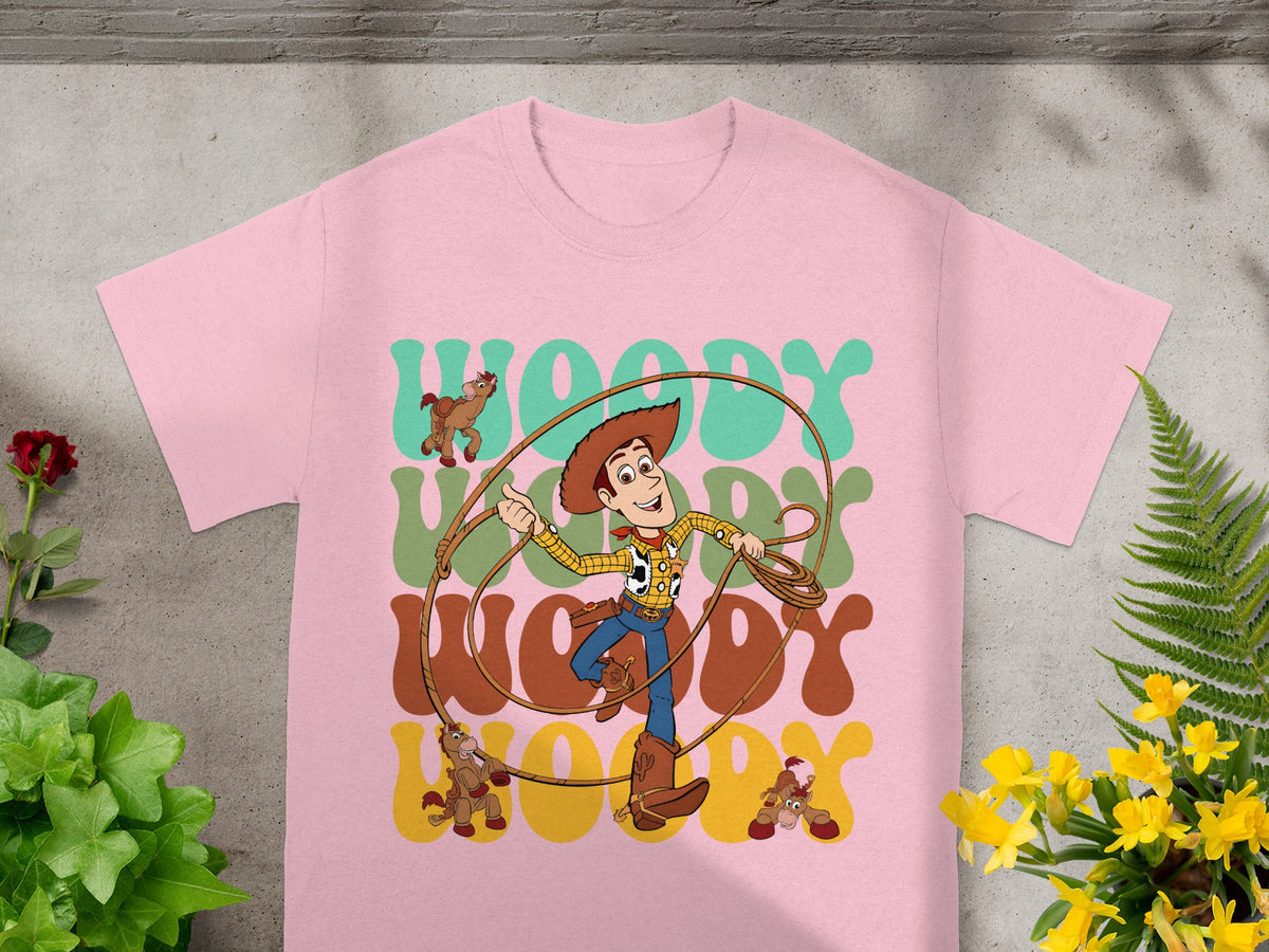 Woody from Toy Story with "WOODY" text on a pink t-shirt.
