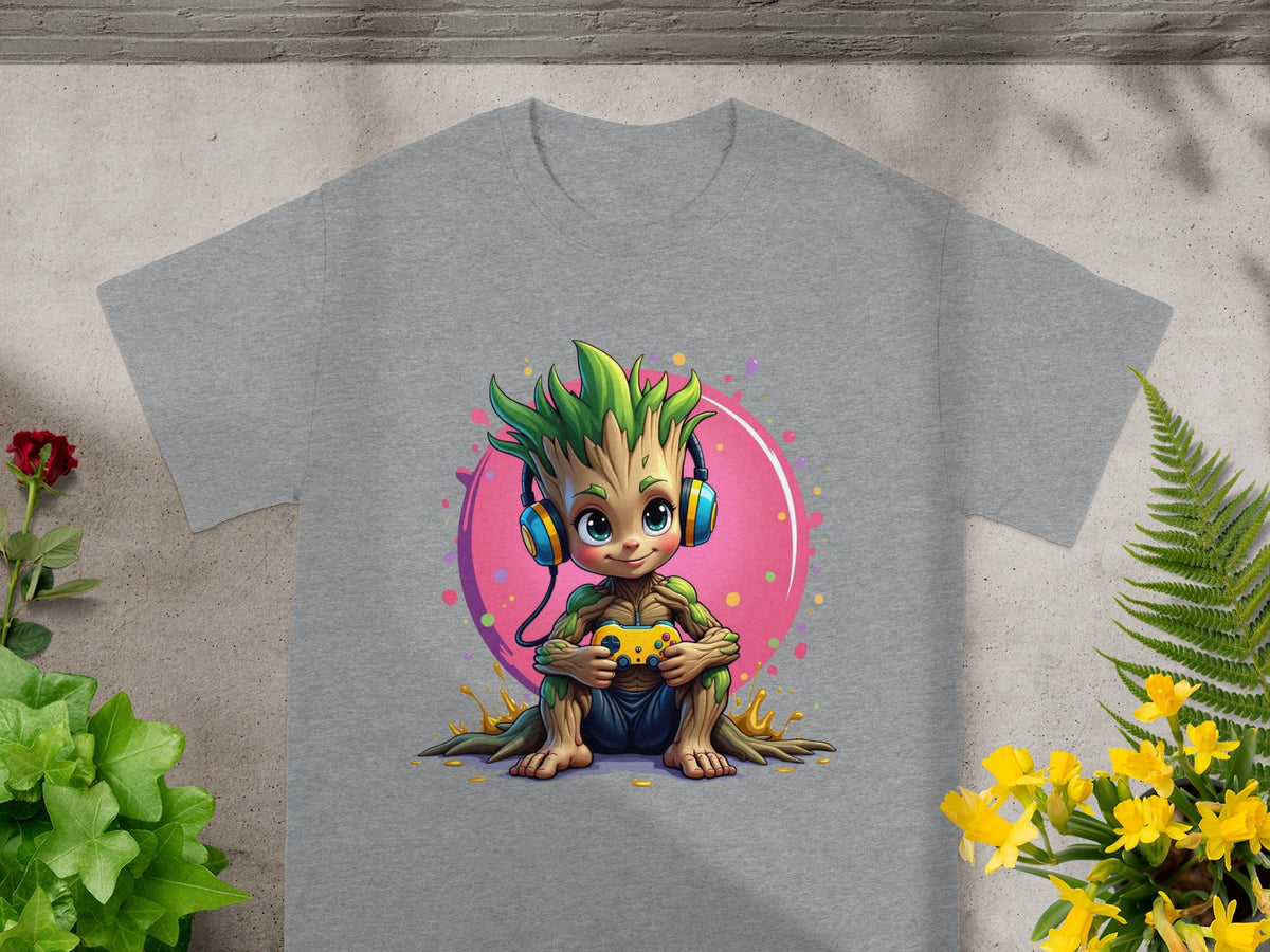 Baby Groot wearing headphones holds a video game controller.