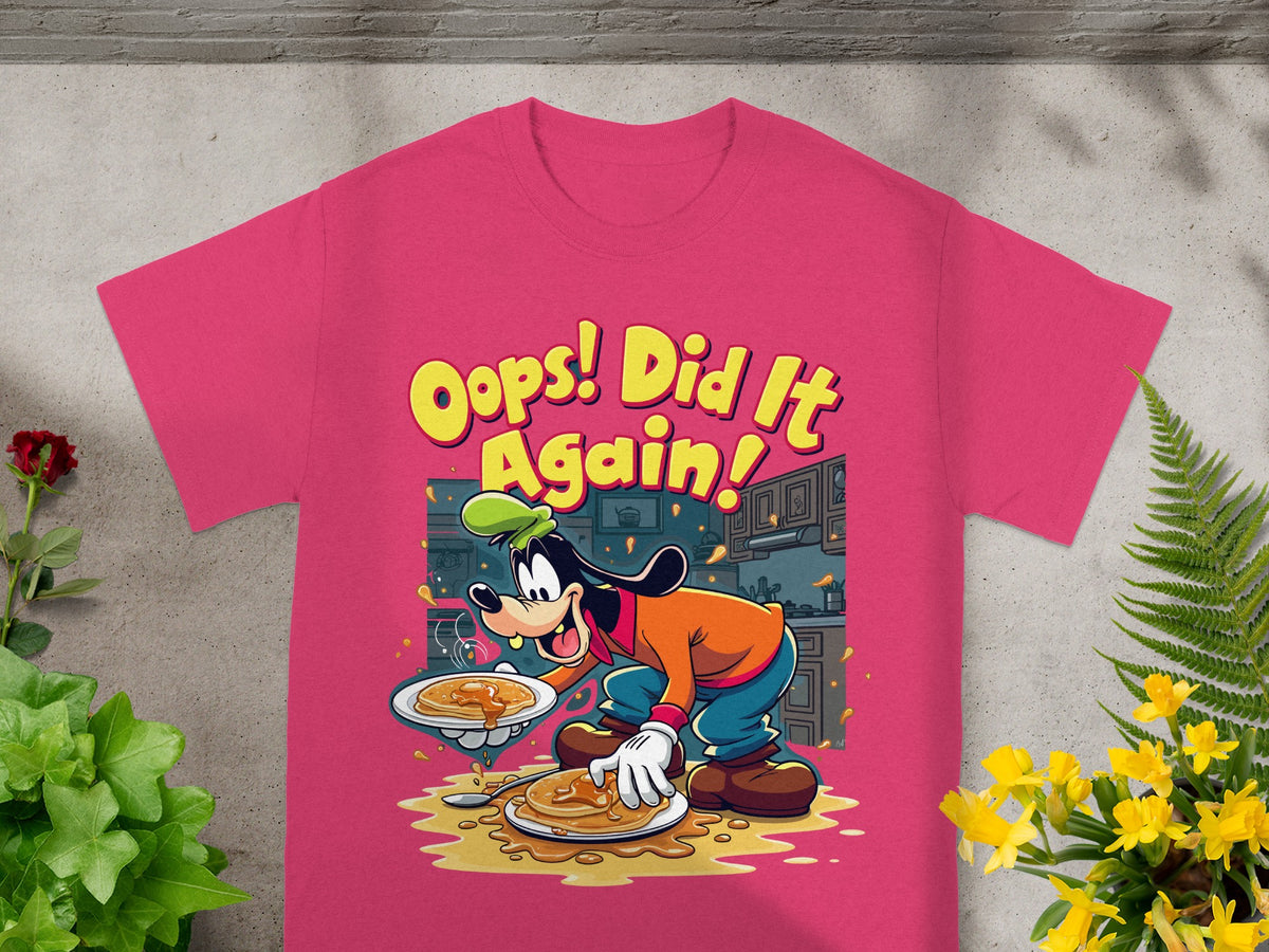 Pink t-shirt with cartoon Goofy spilling pancakes and text "Oops! Did It Again!".