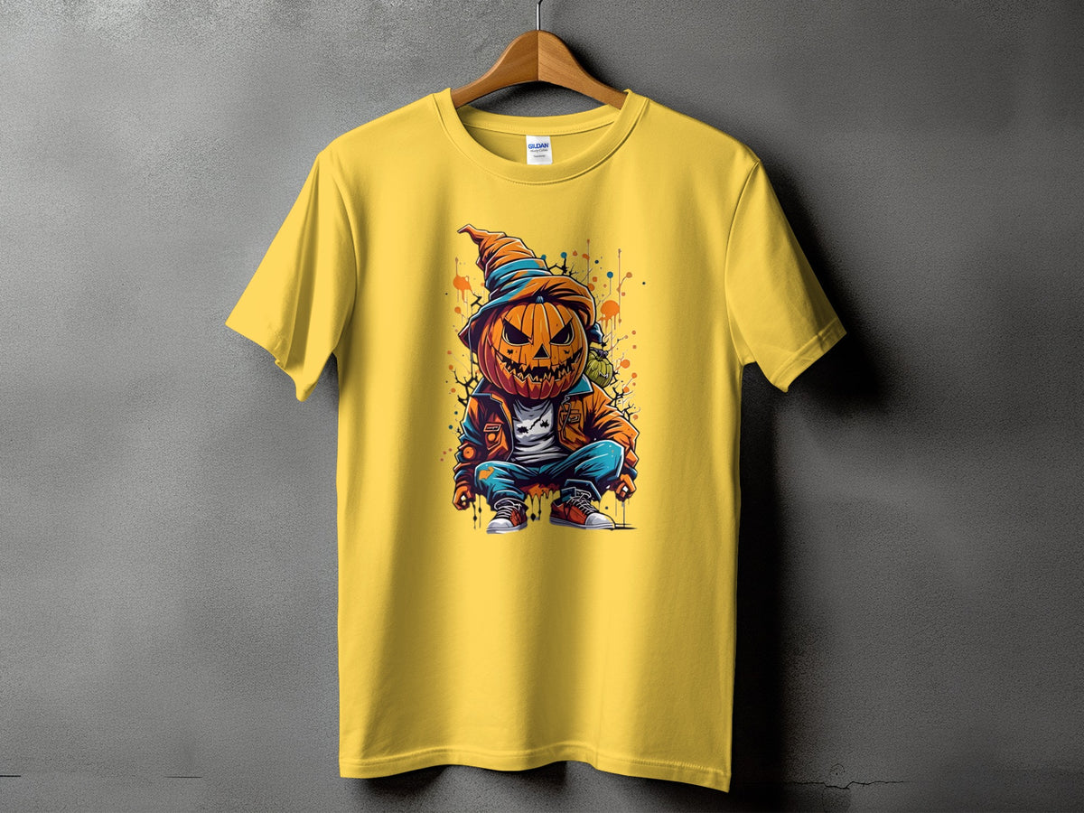 Yellow t-shirt with a graphic of a crouching cartoon pumpkin wearing a hat and jacket.
