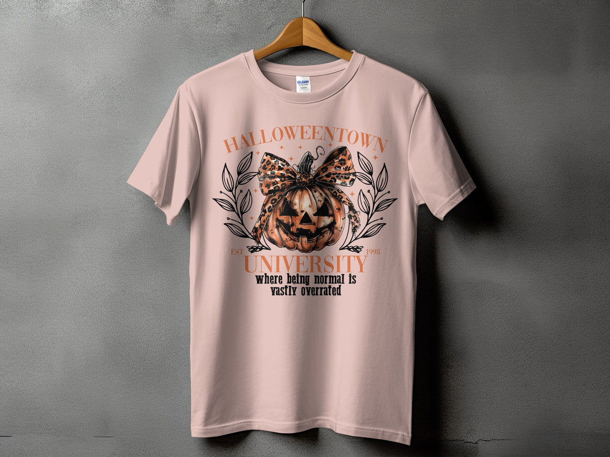 Halloweentown University t-shirt with a jack-o'-lantern, leopard print bow, and text.