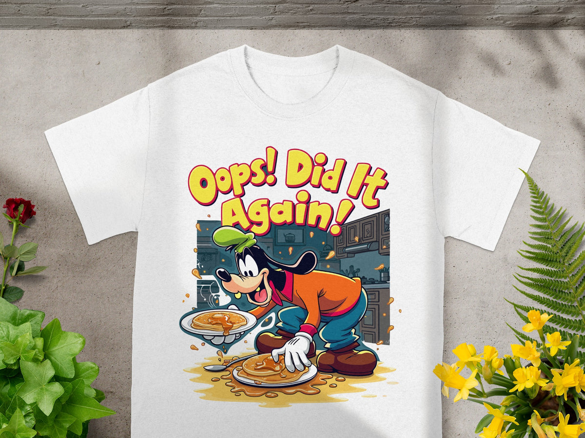 Goofy in cartoon style wearing a chef hat and apron, serving pancakes with text "Oops! Did It Again!"