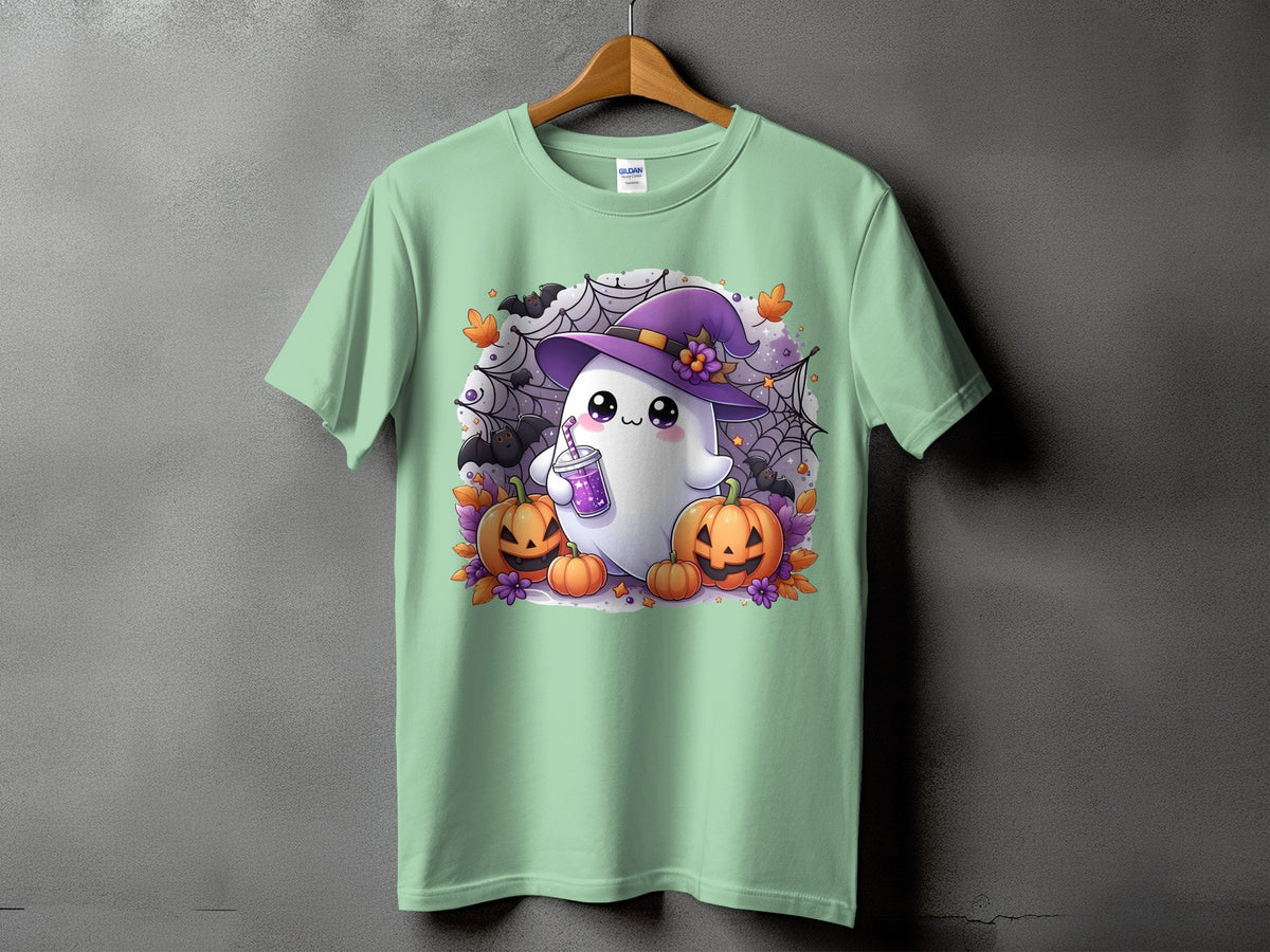 Green t-shirt with cartoon ghost wearing a witch hat and holding a drink.