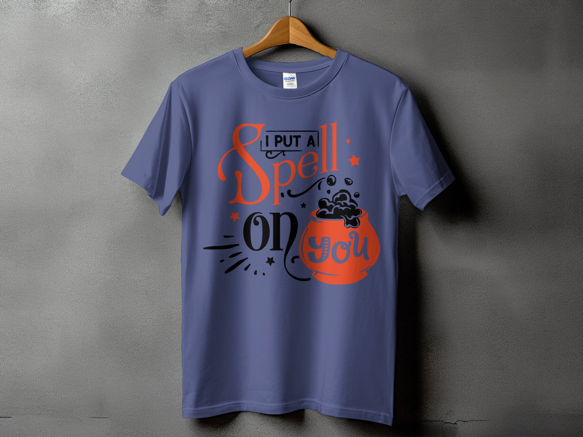 Purple t-shirt with "I PUT A Spell on YOU" Halloween graphic.