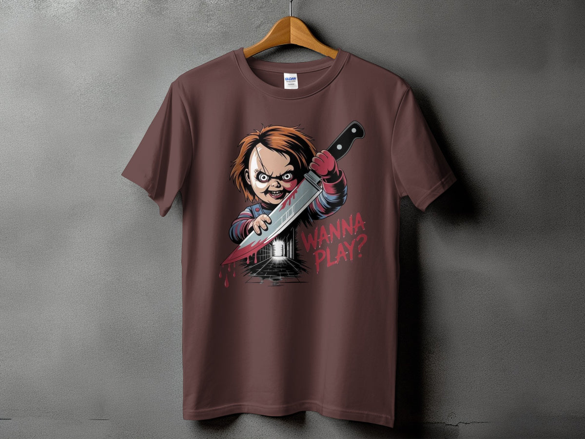 Chucky doll with knife on brown t-shirt with text "WANNA PLAY?".