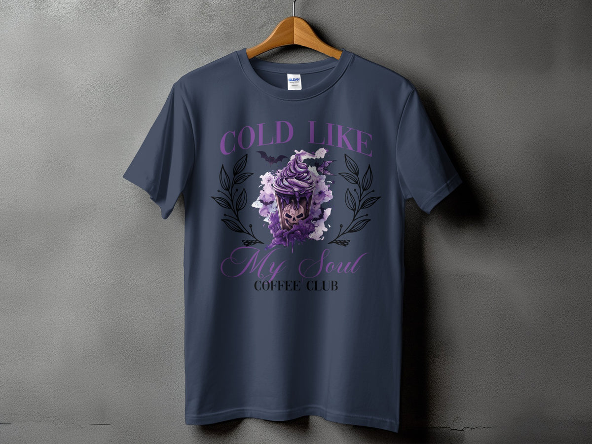 Dark blue t-shirt with "COLD LIKE My Soul COFFEE CLUB" text and skull coffee graphic.