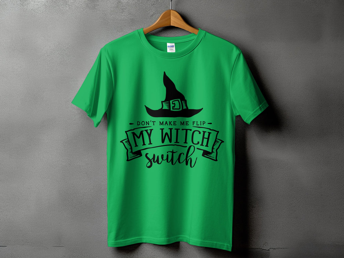 Green t-shirt with black witch hat graphic and text "Don't Make Me Flip My Witch Switch".