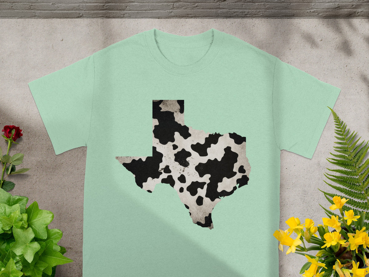Light green t-shirt with Texas outline in cow print pattern.