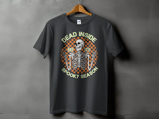 Dark t-shirt with skeleton graphic and text "DEAD INSIDE BUT IT'S SPOOKY SEASON"
