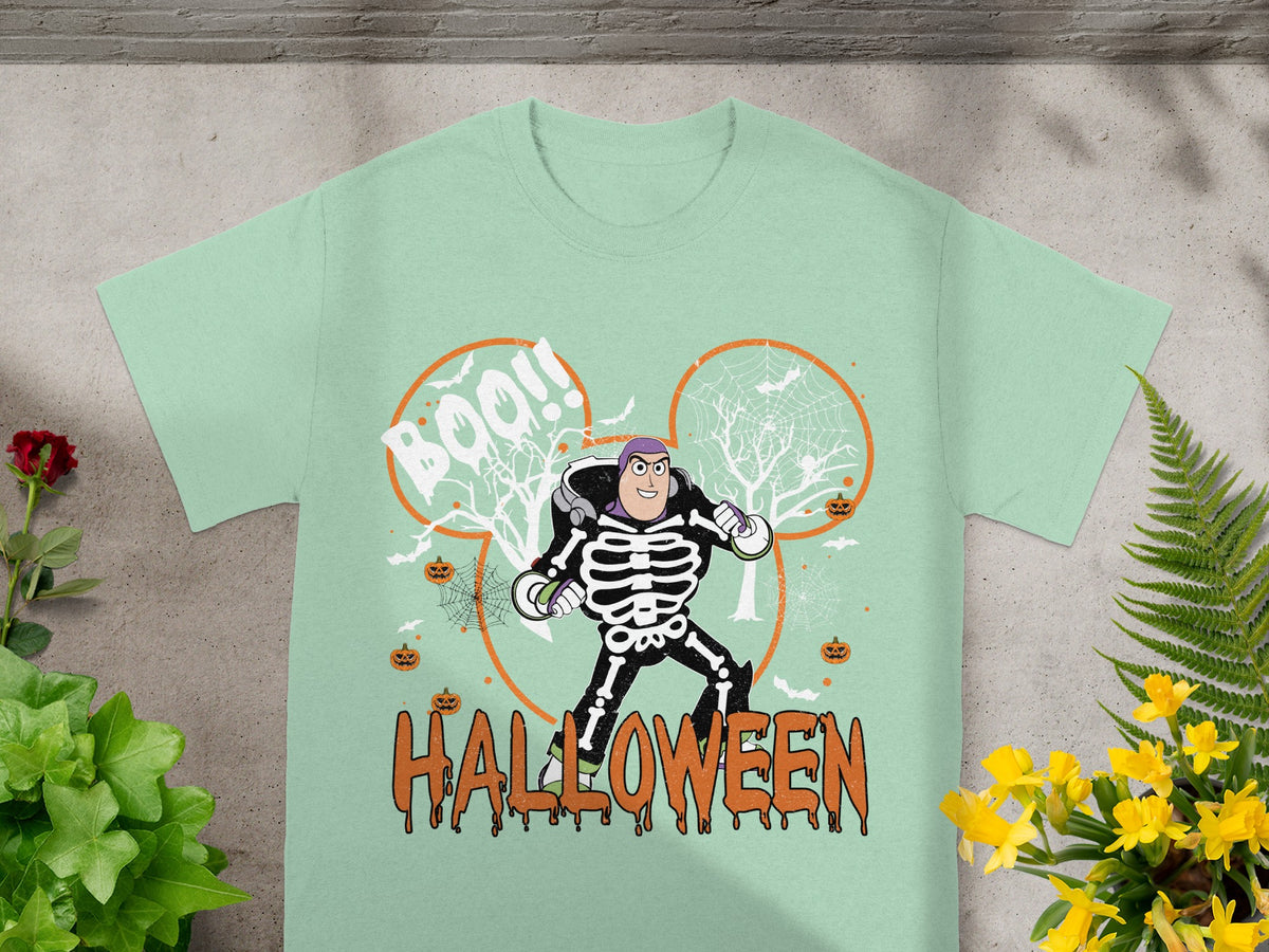 Light green t-shirt with Buzz Lightyear in skeleton costume and "Halloween" text.