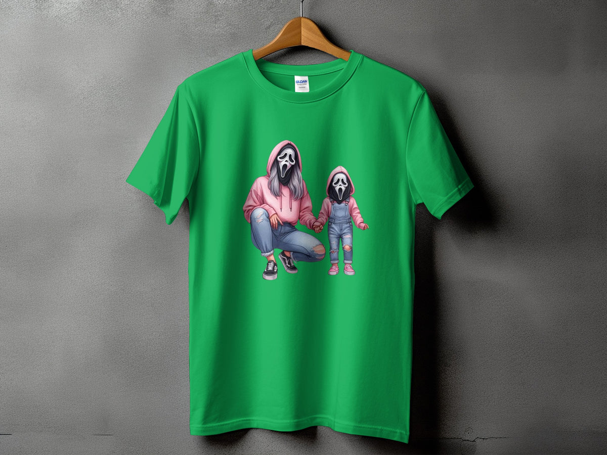 Green t-shirt with graphic of a woman and child wearing ghost masks.